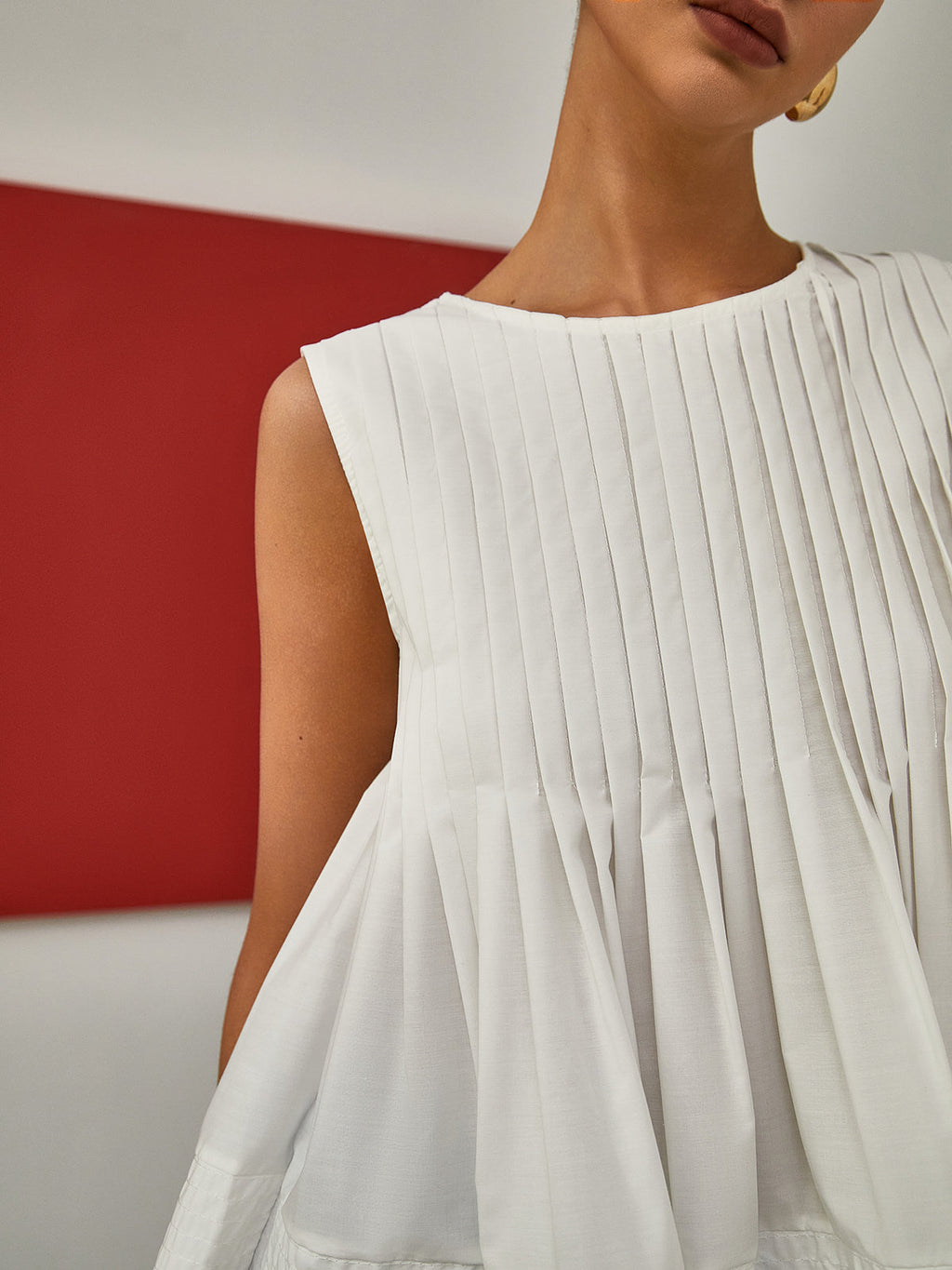 Ava – Pleated Peplum Sleeveless Blouse - Image 3