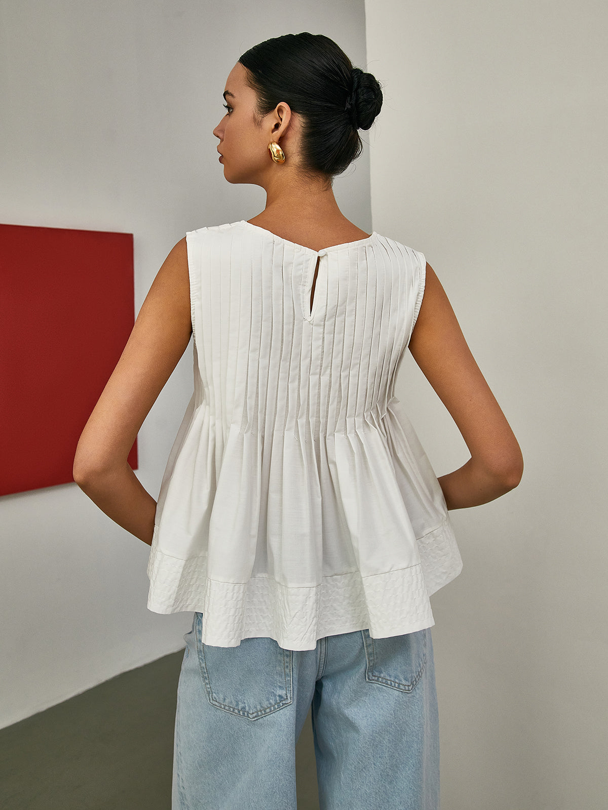 Ava – Pleated Peplum Sleeveless Blouse - Image 4